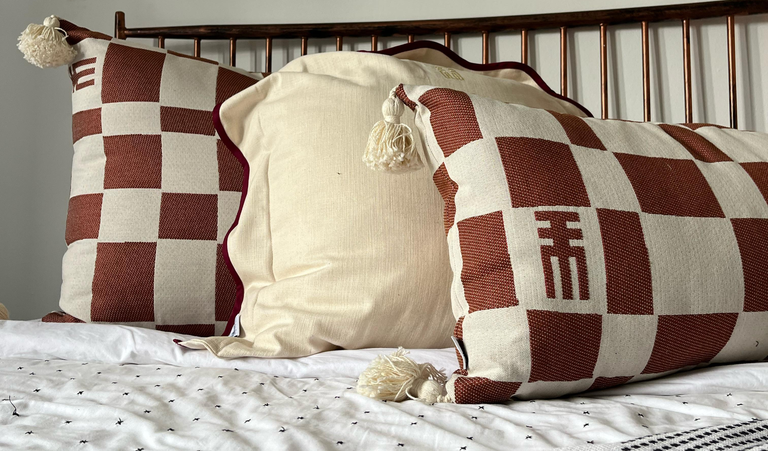 Scallop and checkmate scatter pillows by Rialheim in South Africa 